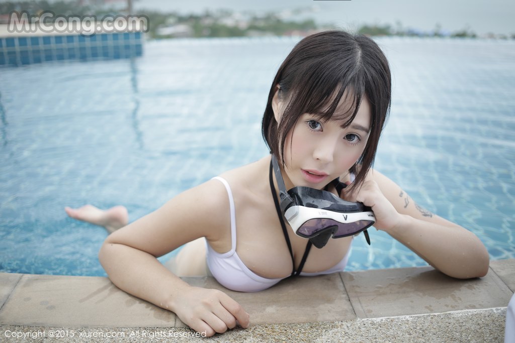 XIUREN No.434: Model Evelyn (艾莉) (56 photos)