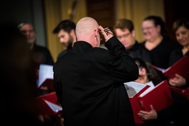 Pierre gets the note with his tuning fork - photo credit Iryna Zamchevska (OCISO)