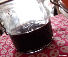 Freshly homemade vanilla bean paste in the jar ready for baking Freshly homemade vanilla bean paste in the jar ready for baking