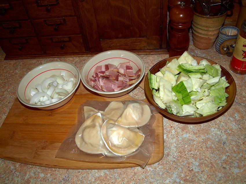 Pellet Smoker Cooking Pork Chops W/ Pierogies, Bacon, Onions and Cabbage