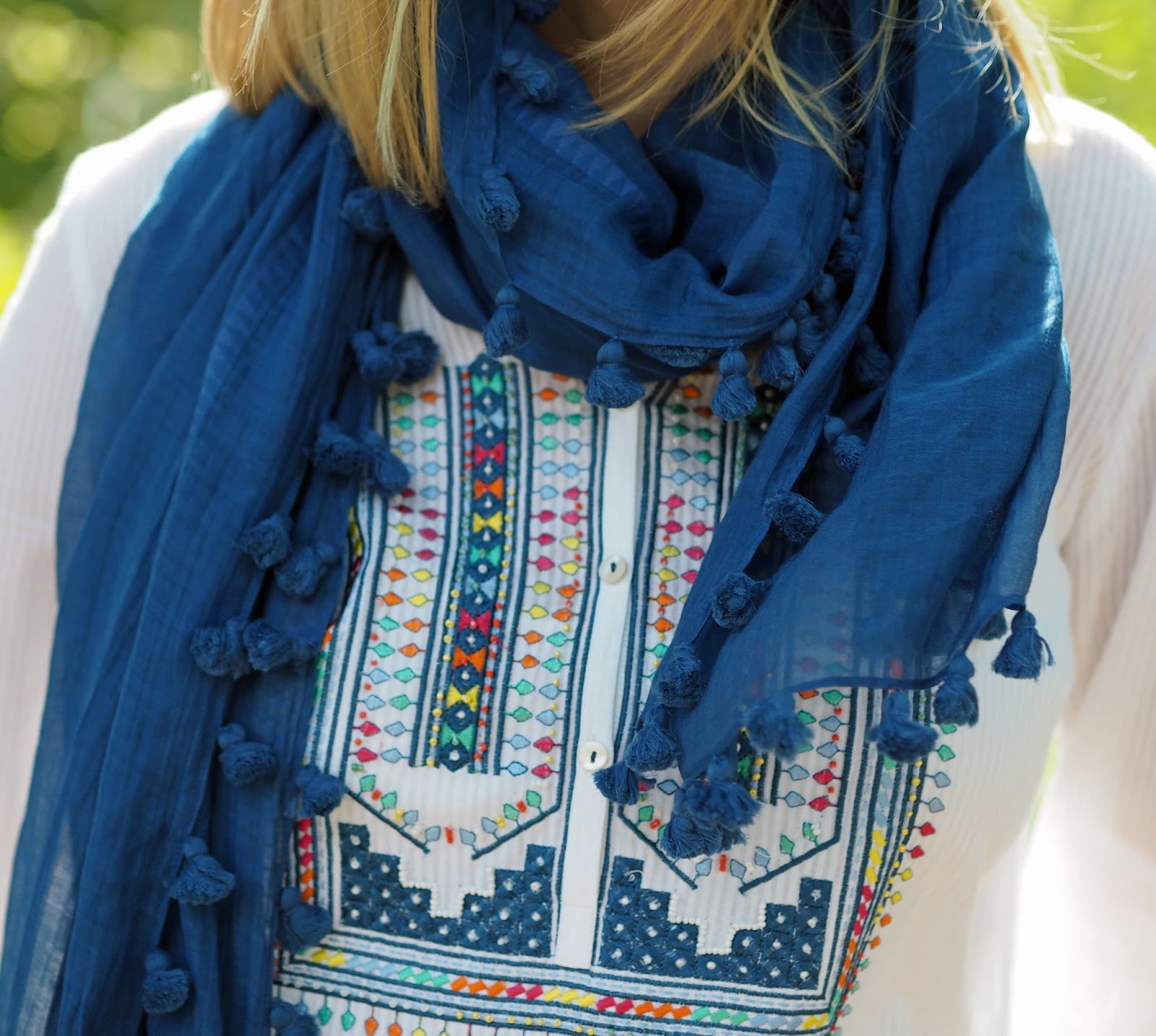 What Lizzy Loves Embroidered white top with blue pompom scarf