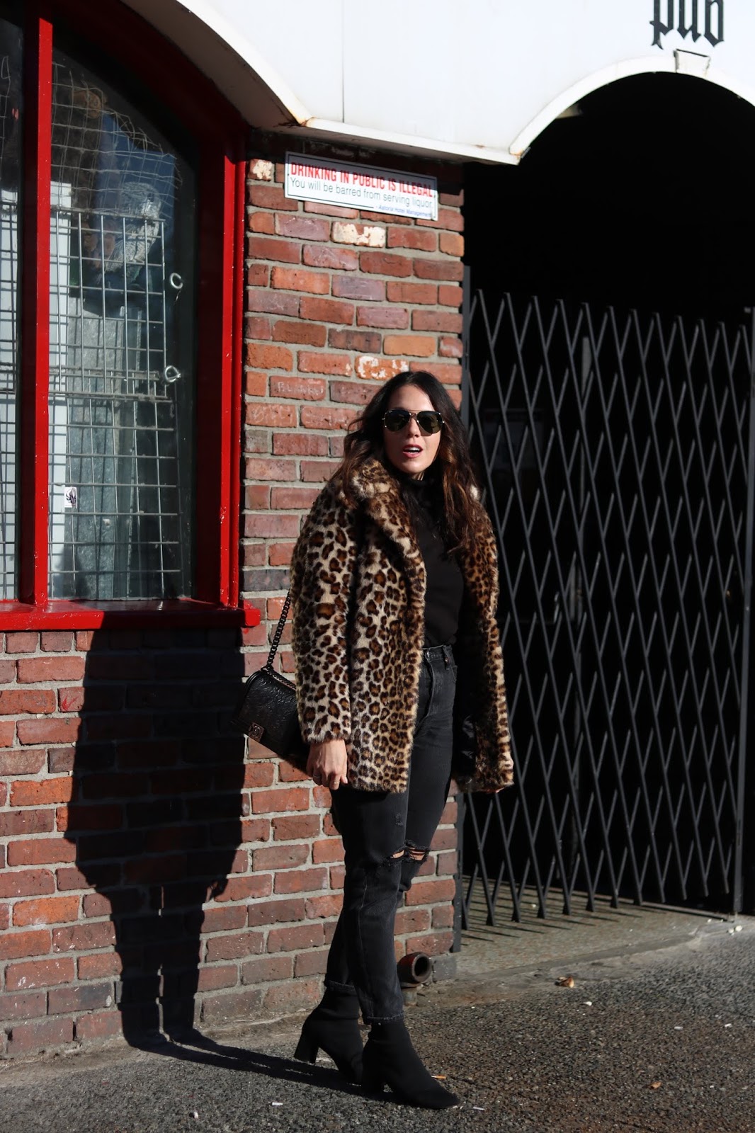 leopard faux fur coat ever new blogger outfit levis wedgie jeans chanel boy bag aleesha harris