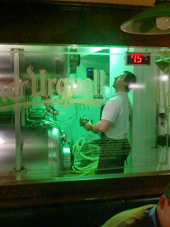 Man filling beer kegs