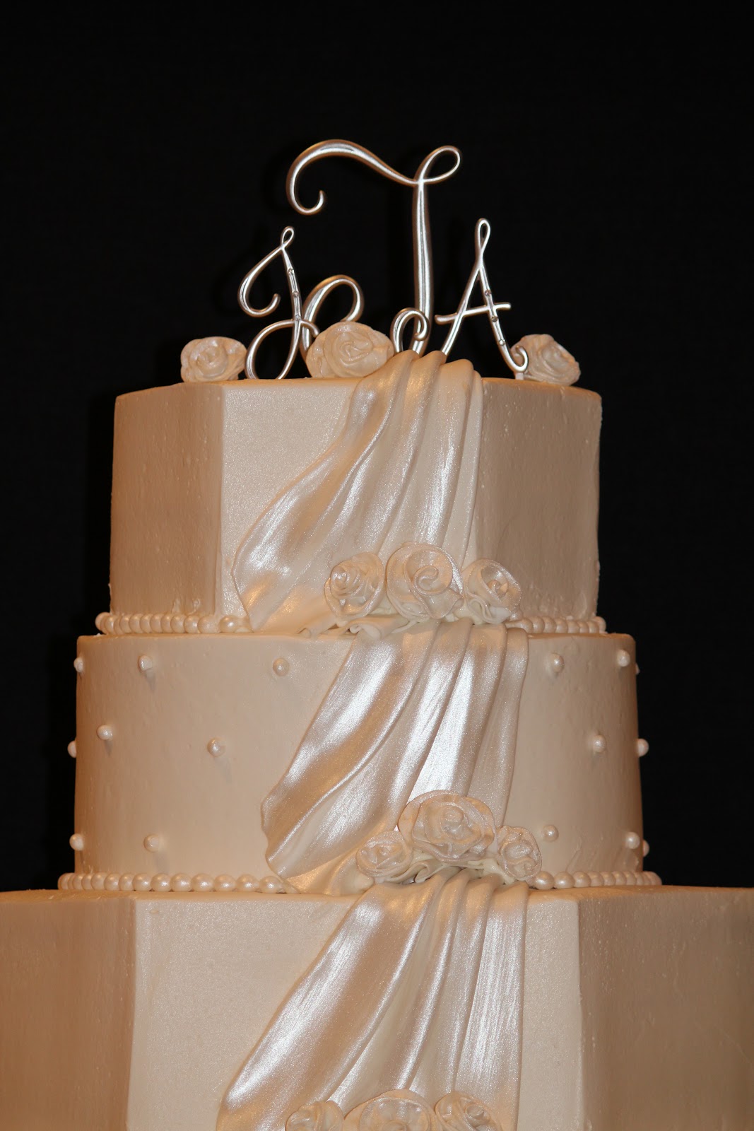 Old World Cake Co., LLC: Pearls and fondant drape highlighted by ...
