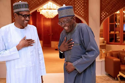 Photo: What did President Buhari tell this man that left him in splits?