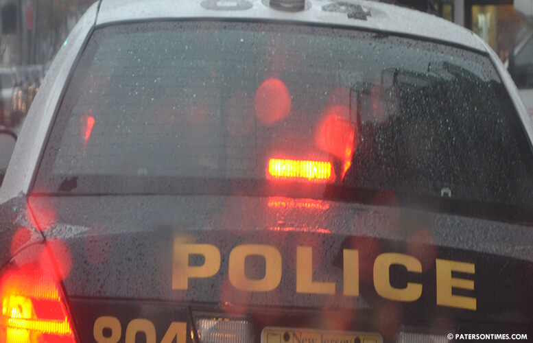 Paterson detectives arrest armed suspect after chase through backyard