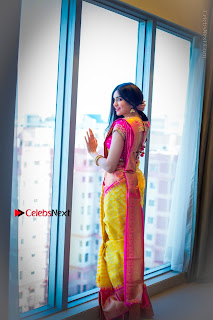 Actress Adah Sharma Exclusive Poshoot in Beautiful Yellow Silk Saree at Saree Niketan Showroom Launch  0006