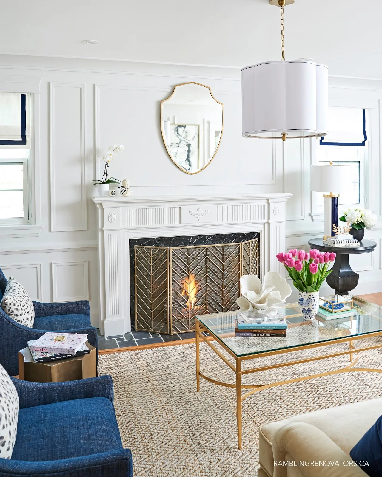 modern traditional colonial living room, painted moulding, buffalo plaid chair