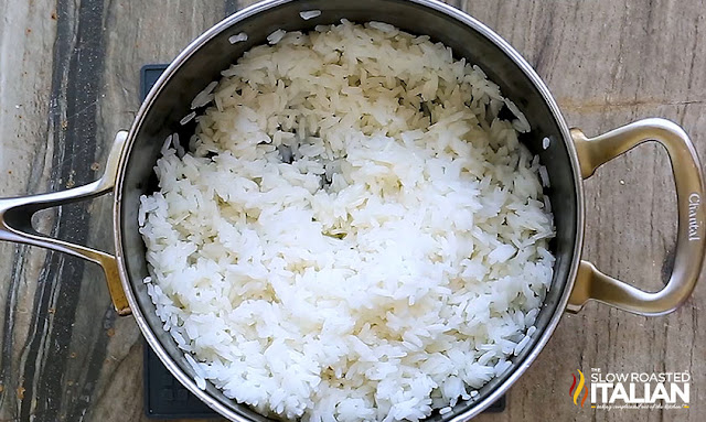 Chipotle Rice Recipe Cooked in a pot and fluffed with a fork