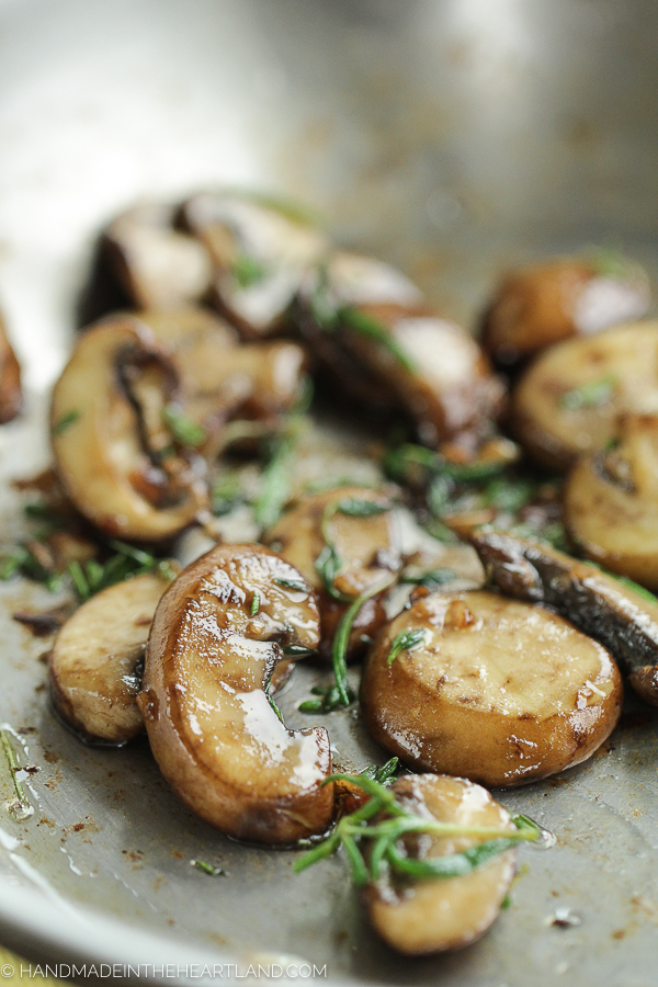 Cooking mushrooms with rosemary