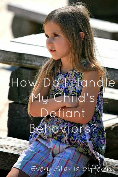 How do I handle my child's defiant behaviors?