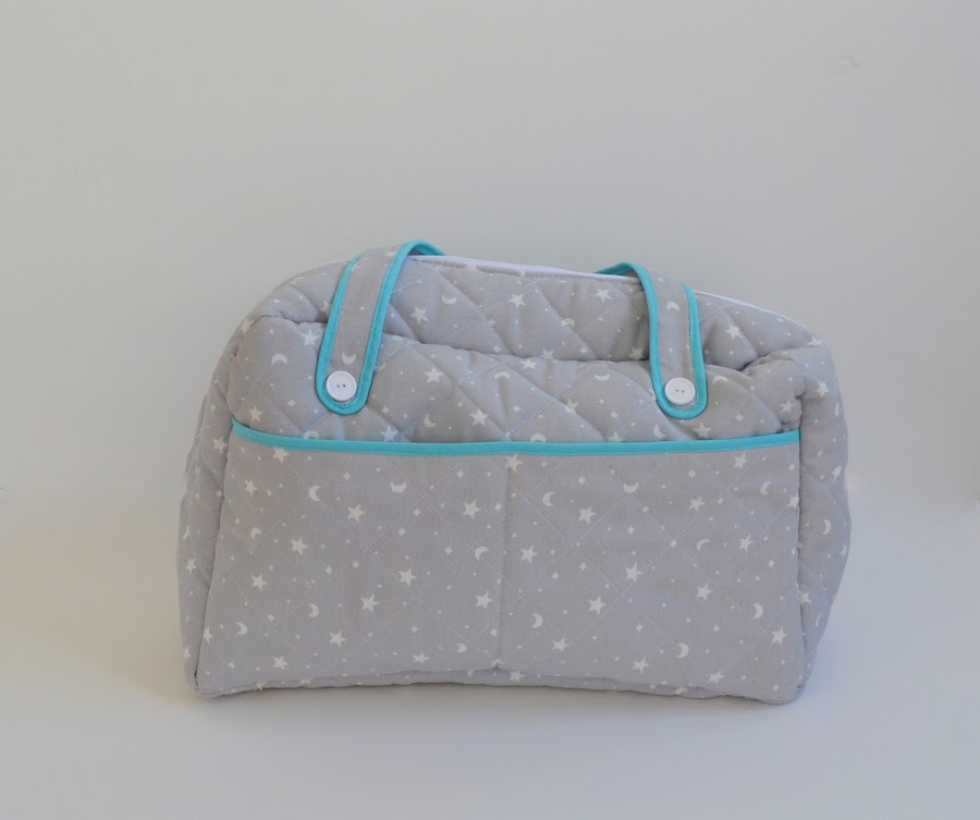 http://www.elrincondefrifri.com/2014/12/costura-bolso-bebe-diy.html