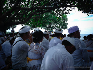 Villagers Attend The Melasti Balinese Ceremonial As A Series Of Nyepi Day, They Are Sitting Under The Shady Trees On The Beach