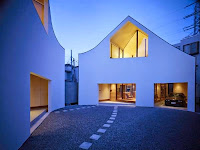 Contemporary Two-Volume House Design with Separate Structures That are Still Unified