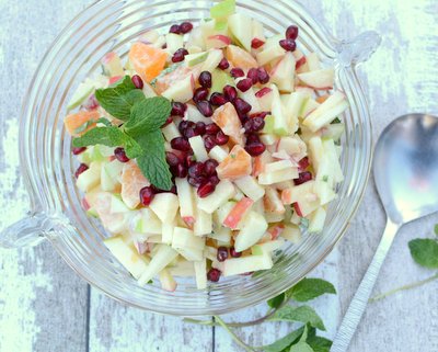Apple Yogurt Salad ♥ KitchenParade.com, a winter fruit salad, just apples with Greek yogurt, tangerines, pomegranate, fresh mint and a touch of cardamon. Great for winter brunches, Christmas morning, light holiday desserts. Weight Watchers Friendly. Weeknight Easy, Weekend Special. Gluten Free.