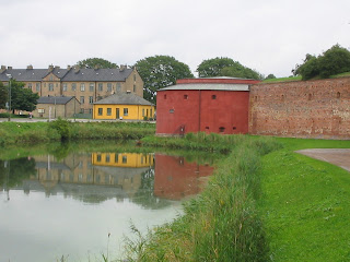 company building protective wall or moat