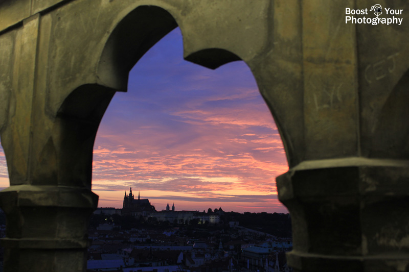 Sunset over Prague Castle, framed by the Astronomical Tower | Boost Your Photography