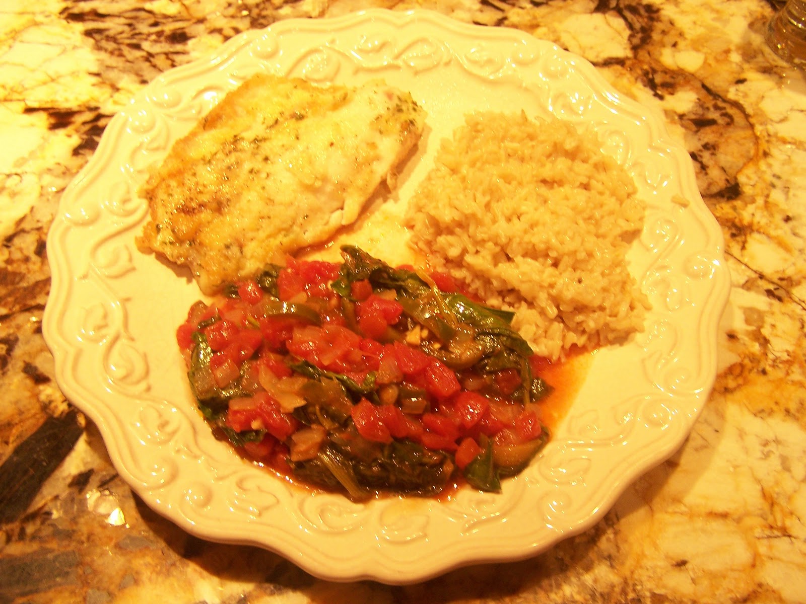 Claudia's cooking Tilapia Fish, Spinach and Brown Rice