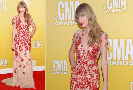 Taylor Swift wore Jenny Packham Spring 2012 nude lace gown at the 46th Annual CMA Awards held at the Bridgestone Arena in Nashville