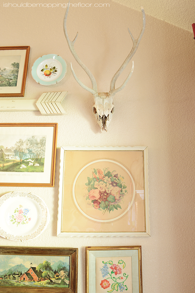 DIY Vintage Art Gallery Wall | Collect pieces from thrift stores and flea markets for a fun, budget-friendly display.
