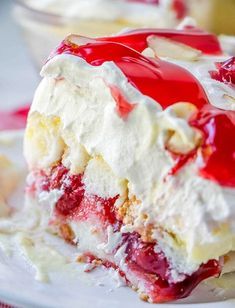 Heaven on Earth Cake with delicious layers of angel cake, sour cream pudding, cherry pie filling, whipped topping, and almonds. Creamy and decadent, this cherry trifle is a sure crowd pleaser!