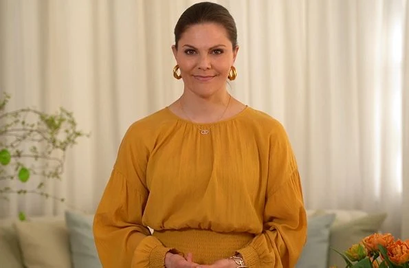 Crown Princess Victoria wore Rodebjer Roma dress, skirt and blouse, and Sophie by Sophie gold earrings