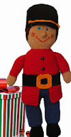 http://www.ravelry.com/patterns/library/toy-soldier-crochet-doll