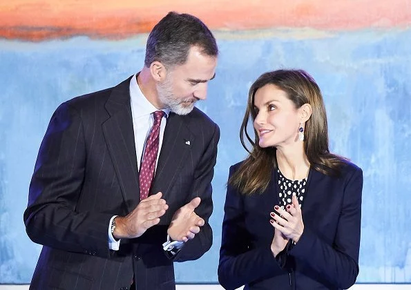 Queen Letizia wore Carolina Herrera blouse and Hugo Boss suit