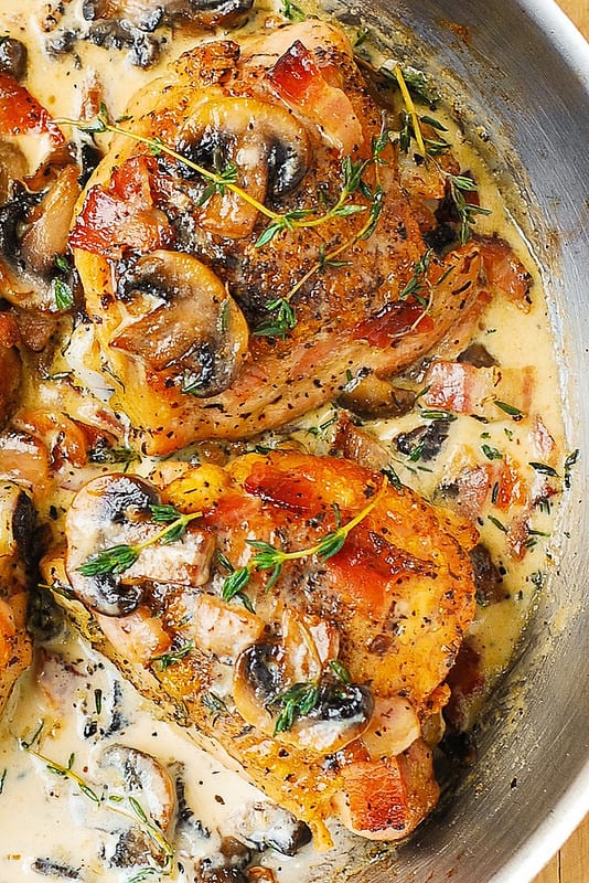 CHICKEN THIGHS WITH CREAMY BACON MUSHROOM THYME SAUCE FOOD AND DRINK
