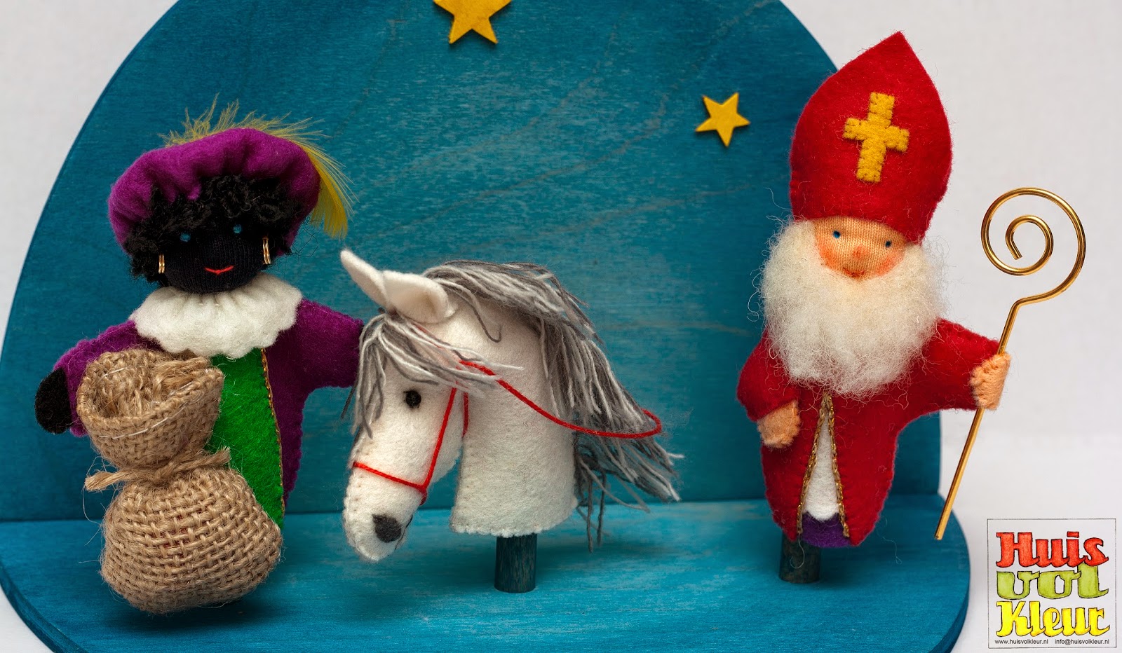 Huisvolkleur: Sinterklaas, en Americo vingerpopjes