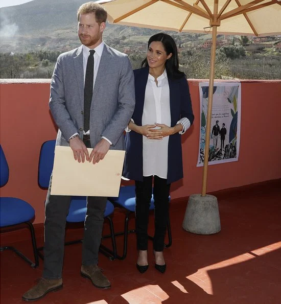 Meghan Markle wore Alice + Olivia Simpson blazer, Birdies blackbird smoking slippers, Boh Runga gold studs