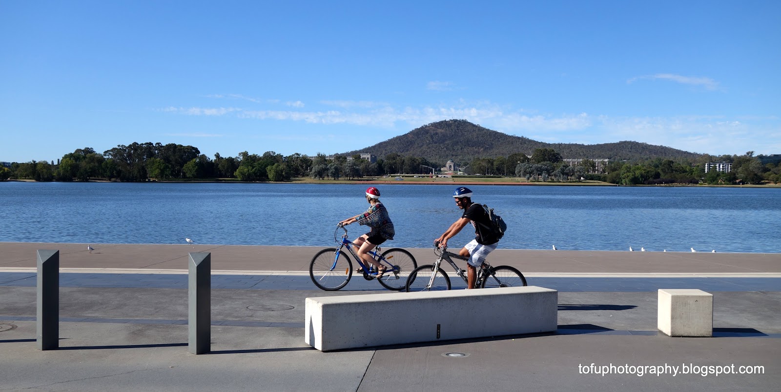 Tofu Photography Cyclists by the shores of Lake Burley Griffin in Canberra