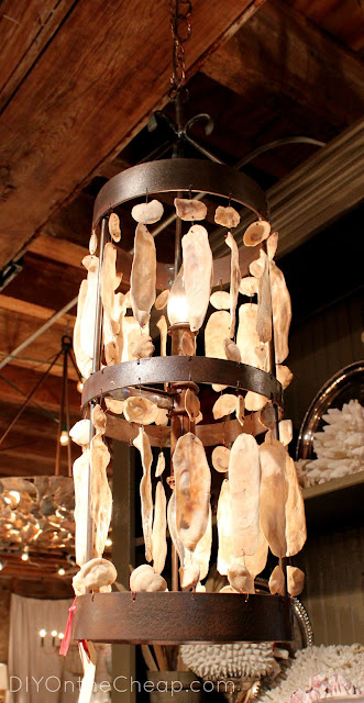 Unique oyster shell chandelier {spotted in The Paris Market in Savannah}