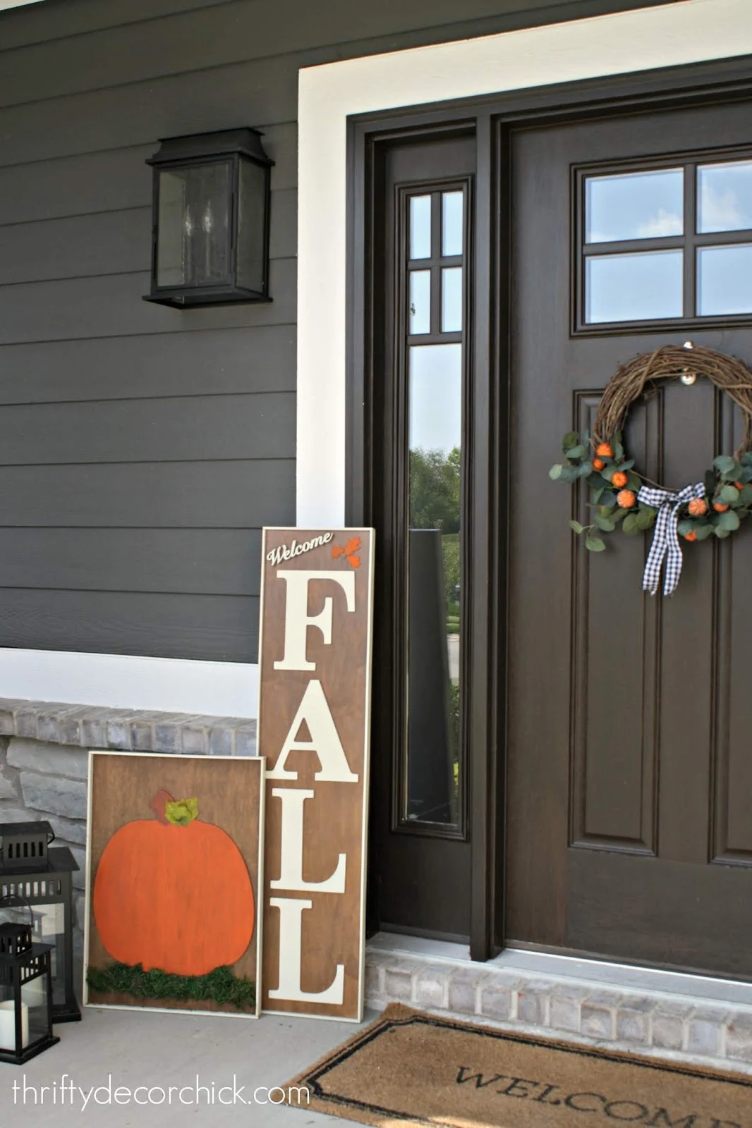 stained DIY fall signs on front porch