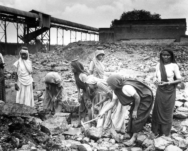 Women labourers in the coalmining industry in India. A large number of