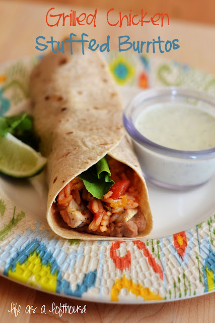 These burritos are whole wheat tortillas filled with flavorful grilled chicken, Mexican rice, refried beans and chopped lettuce and tomato. Life-in-the-Lofthouse.com