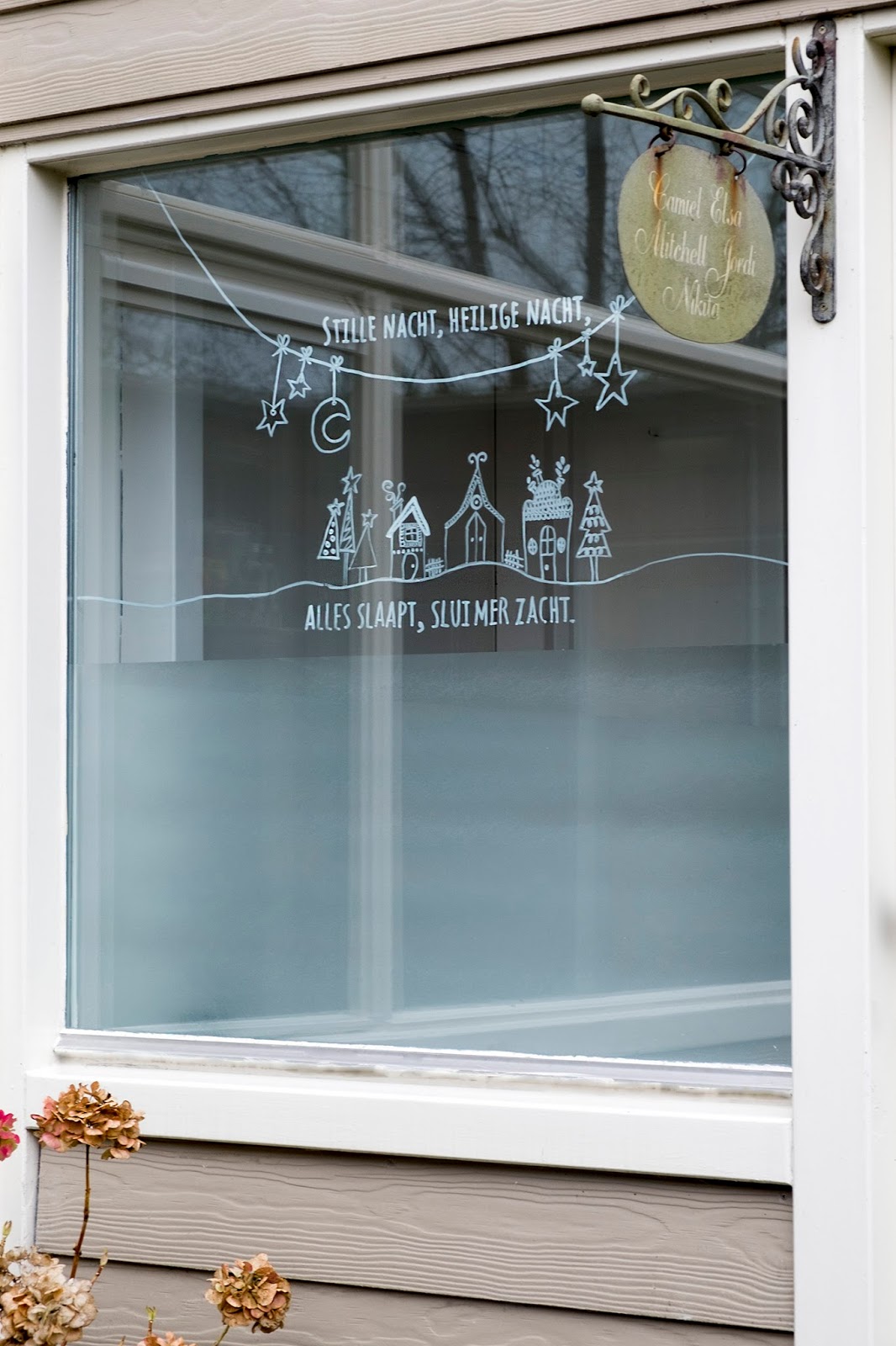 Hoe versier je raam met krijtstift Hoe versier je raam met krijtstift