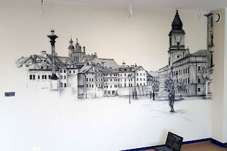 Artystyczne malowanie sciany Malowanie obrazu na ścianie, mural przedstawia Warszawską Starówkę, obraz malowany na scianie farbami akrylowymi