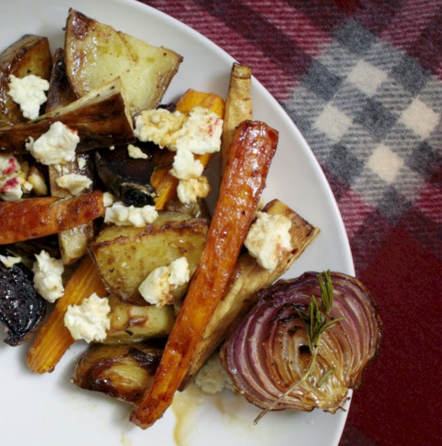 A simple dish of rosemary roasted root vegetables drizzled with balsamic vinegar and maple syrup topped with crumbled feta.  A welcome addition to any Sunday lunch!