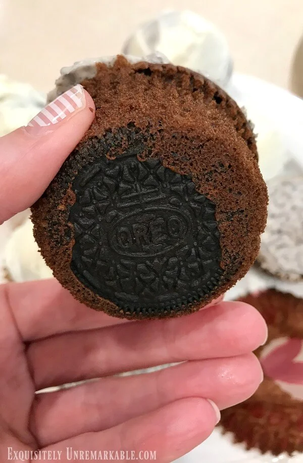 Oreo Cookie Bottom Cupcakes in hand
