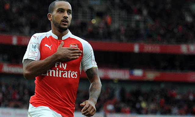 Theo Walcott proves he's a great guy by getting an Arsenal fan on the pitch to celebrate victory