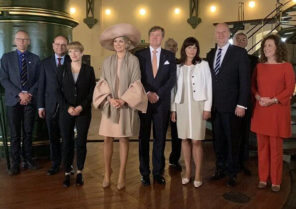 Brandenburg's Prime Minister Dietmar Woidke and his wife Susanne Woidke. Queen mMaxima wore Natan dress