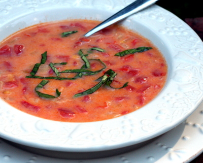 Summer's Tomato Soup, another fresh & seasonal summer soup ♥ KitchenParade.com, beautiful color, made with summer's best fresh tomatoes. Looks simple, tastes complex.