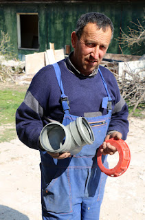Bekir with some (incorrect) plumbing parts Bekir with some (incorrect) plumbing parts