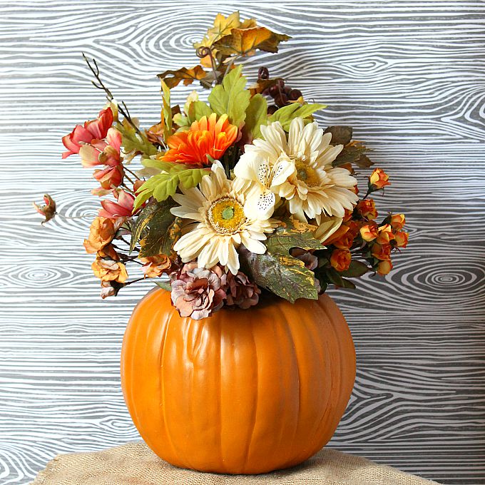Turn a fake pumpkin into a beautiful floral centerpiece for fall!