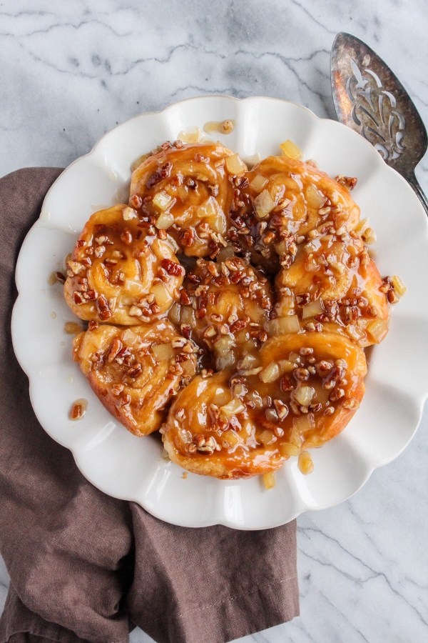 There's nothing better on a cold morning than baking up a pan of these warm and delicious Salted Caramel Apple Cinnamon Rolls. It's a comforting breakfast that the whole family will love!