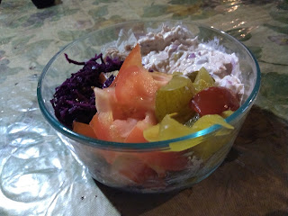summer dinner in February: red cabbaage cole slaw, tuna salad, tomatoes and bread and butter pickles