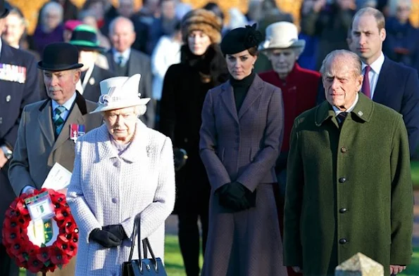 Queen Elizabeth II, Kate Middleton, Prince Philip, Duke of Edinburgh and Prince William, Duke of Cambridge attend a wreath laying ceremony to mark the 100th anniversary of the final withdrawal from the Gallipoli Peninsula at the War Memorial Cross