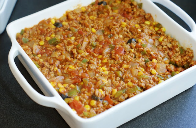 Tamale Pie Casserole Ground Beef Filling Spread in Baking Dish Image