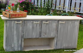 old kitchen cupboard turned storage counter and bar http://bec4-beyondthepicketfence.blogspot.com/2014/06/1-old-cupboardreclaimed-wood2-cut-colors.html